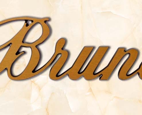 articolo-26-bruno-scritta-in-bronzo
