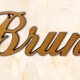 articolo-26-bruno-scritta-in-bronzo