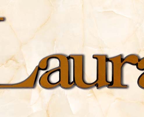 articolo-43-laura-scritta-in-bronzo