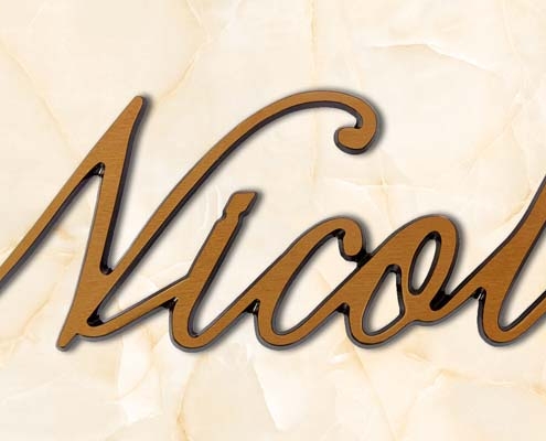 articolo-49-nicola-scritta-in-bronzo