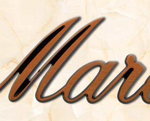 articolo-55-mare-scritta-in-bronzo