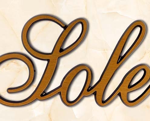articolo-56-sole-scritta-in-bronzo